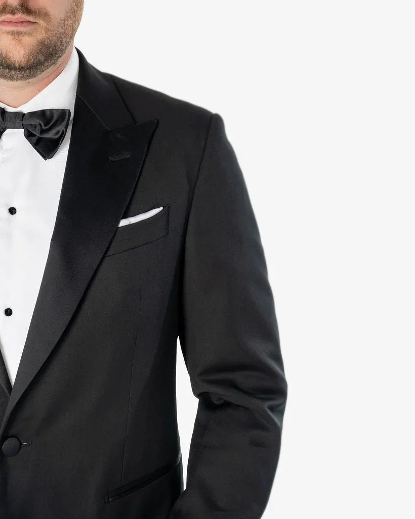 Hoogwaardige 100% wol smokingmateriaal huur